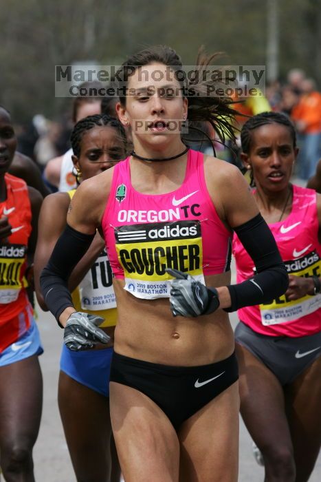 Kara Goucher was the third female to cross the finish line with a time of 2:32:25.  The 113th Boston Marathon took place on Monday, April 20, 2009.

Filename: SRM_20090420_10333902.JPG
Aperture: f/8.0
Shutter Speed: 1/800
Body: Canon EOS-1D Mark II
Lens: Canon EF 100-400mm f/4.5-5.6 L IS USM