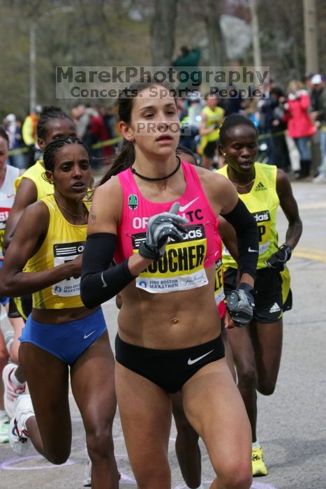 Kara Goucher was the third female to cross the finish line with a time of 2:32:25.  The 113th Boston Marathon took place on Monday, April 20, 2009.

Filename: SRM_20090420_10333904.JPG
Aperture: f/8.0
Shutter Speed: 1/800
Body: Canon EOS-1D Mark II
Lens: Canon EF 100-400mm f/4.5-5.6 L IS USM