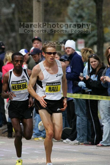 Ryan Hall was third to cross the finish line with a time of 2:09:40.  The 113th Boston Marathon took place on Monday, April 20, 2009.

Filename: SRM_20090420_10401626.JPG
Aperture: f/8.0
Shutter Speed: 1/1000
Body: Canon EOS-1D Mark II
Lens: Canon EF 100-400mm f/4.5-5.6 L IS USM