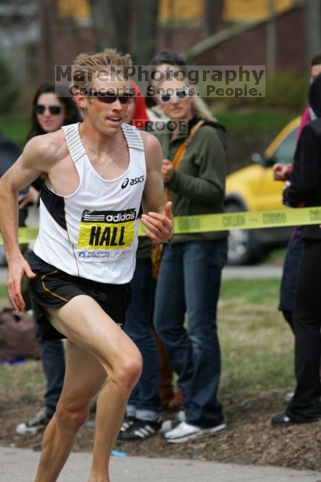 Ryan Hall was third to cross the finish line with a time of 2:09:40.  The 113th Boston Marathon took place on Monday, April 20, 2009.

Filename: SRM_20090420_10401830.JPG
Aperture: f/8.0
Shutter Speed: 1/1000
Body: Canon EOS-1D Mark II
Lens: Canon EF 100-400mm f/4.5-5.6 L IS USM