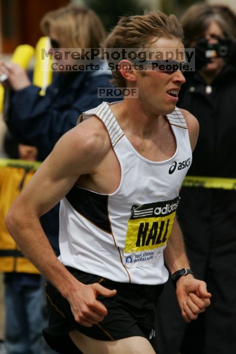 Ryan Hall was third to cross the finish line with a time of 2:09:40.  The 113th Boston Marathon took place on Monday, April 20, 2009.

Filename: SRM_20090420_10402041.JPG
Aperture: f/8.0
Shutter Speed: 1/1600
Body: Canon EOS-1D Mark II
Lens: Canon EF 100-400mm f/4.5-5.6 L IS USM