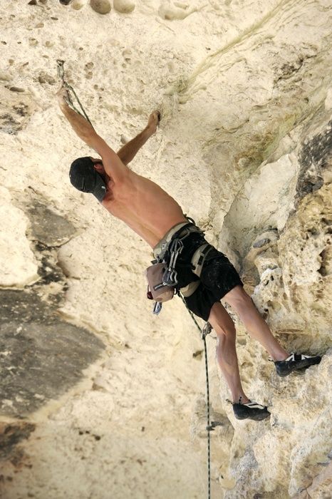 Tyler climbing Lonsome Dove (5.12), the roof above Diving for Rocks.  It was another long day of rock climbing at Seismic Wall on Austin's Barton Creek Greenbelt, Sunday, June 7, 2009.

Filename: SRM_20090607_13385376.jpg
Aperture: f/4.0
Shutter Speed: 1/500
Body: Canon EOS-1D Mark II
Lens: Canon EF 80-200mm f/2.8 L