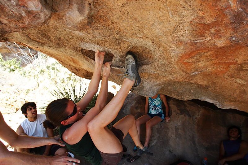 Beth Marek rock climbing on No One Gets Out of Here Alive (V2) in Hueco Tanks State Park and Historic Site during the Hueco Tanks Awesome Fest 2010 trip, Saturday, May 22, 2010.

Filename: SRM_20100522_15322407.JPG
Aperture: f/5.6
Shutter Speed: 1/400
Body: Canon EOS-1D Mark II
Lens: Canon EF 16-35mm f/2.8 L