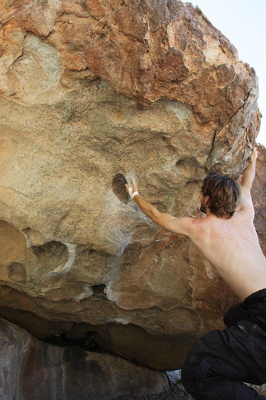 Andrew Dreher rock climbing on No One Gets Out of Here Alive (V2) in Hueco Tanks State Park and Historic Site during the Hueco Tanks Awesome Fest 2010 trip, Sunday, May 23, 2010.

Filename: SRM_20100523_10520249.JPG
Aperture: f/5.6
Shutter Speed: 1/640
Body: Canon EOS-1D Mark II
Lens: Canon EF 16-35mm f/2.8 L