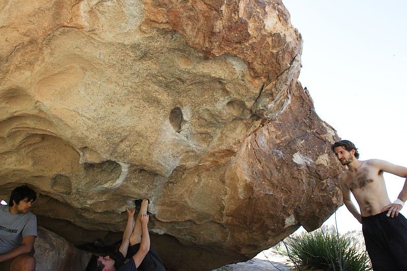 Raanan Robertson rock climbing on No One Gets Out of Here Alive (V2) in Hueco Tanks State Park and Historic Site during the Hueco Tanks Awesome Fest 2010 trip, Sunday, May 23, 2010.

Filename: SRM_20100523_10564074.JPG
Aperture: f/5.6
Shutter Speed: 1/800
Body: Canon EOS-1D Mark II
Lens: Canon EF 16-35mm f/2.8 L