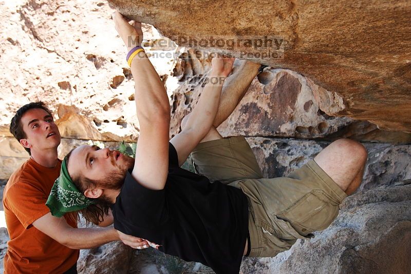 Steve Marek rock climbing on Mexican Chicken (V6) in Hueco Tanks State Park and Historic Site during the Hueco Tanks Awesome Fest 2010 trip, Monday, May 24, 2010.

Filename: SRM_20100524_12165620.JPG
Aperture: f/4.0
Shutter Speed: 1/640
Body: Canon EOS-1D Mark II
Lens: Canon EF 16-35mm f/2.8 L