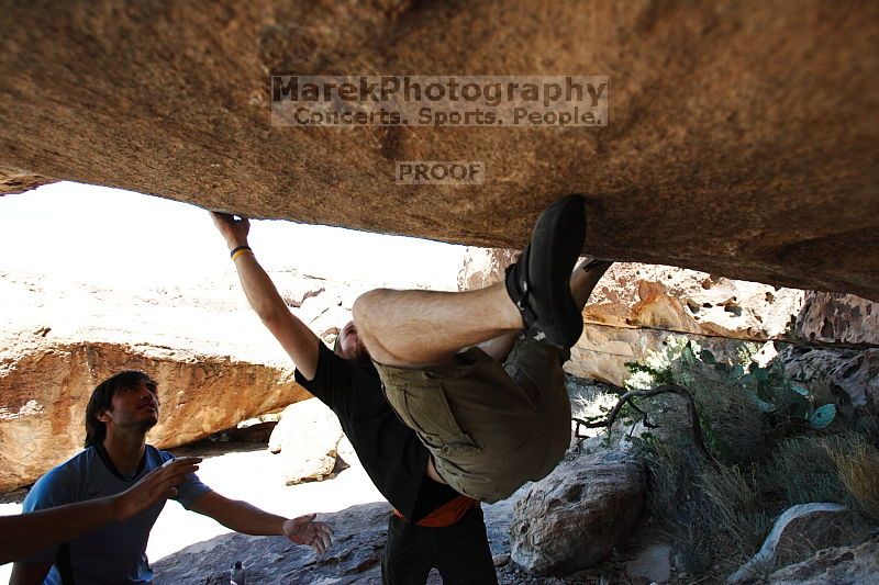 Steve Marek rock climbing on Mexican Chicken (V6) in Hueco Tanks State Park and Historic Site during the Hueco Tanks Awesome Fest 2010 trip, Monday, May 24, 2010.

Filename: SRM_20100524_12202725.JPG
Aperture: f/4.0
Shutter Speed: 1/3200
Body: Canon EOS-1D Mark II
Lens: Canon EF 16-35mm f/2.8 L