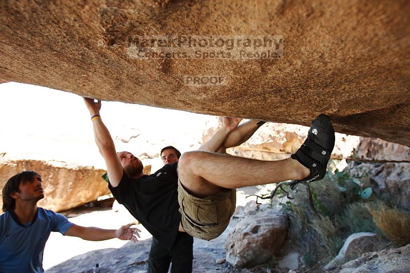 Steve Marek rock climbing on Mexican Chicken (V6) in Hueco Tanks State Park and Historic Site during the Hueco Tanks Awesome Fest 2010 trip, Monday, May 24, 2010.

Filename: SRM_20100524_12202926.JPG
Aperture: f/4.0
Shutter Speed: 1/500
Body: Canon EOS-1D Mark II
Lens: Canon EF 16-35mm f/2.8 L