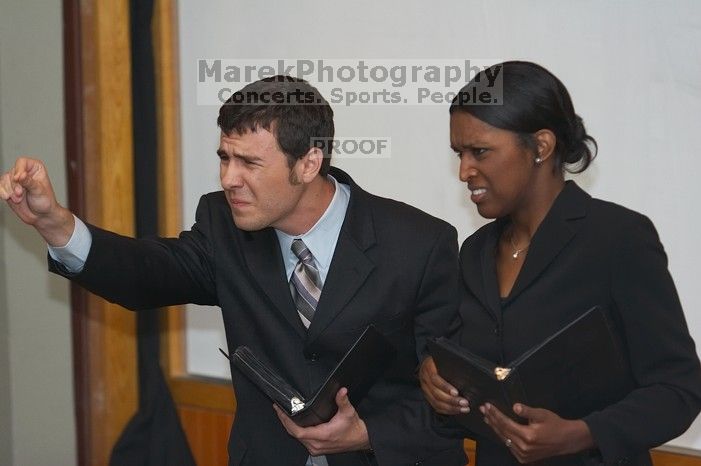 Eric Cullather and Nichole Martin practice their Duo Interpretive of "This Is How It Goes" by Neil Labute.  The University of Texas' Speech Team will compete in the American Forensic Associations National Individual Events Tournament (AFA NIET) in Gainesv

Filename: SRM_20060325_143200_3.jpg
Aperture: f/3.5
Shutter Speed: 1/160
Body: Canon EOS 20D
Lens: Canon EF 80-200mm f/2.8 L