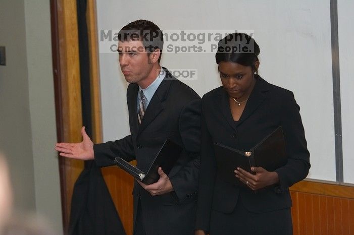 Eric Cullather and Nichole Martin practice their Duo Interpretive of "This Is How It Goes" by Neil Labute.  The University of Texas' Speech Team will compete in the American Forensic Associations National Individual Events Tournament (AFA NIET) in Gainesv

Filename: SRM_20060325_143508_9.jpg
Aperture: f/3.5
Shutter Speed: 1/160
Body: Canon EOS 20D
Lens: Canon EF 80-200mm f/2.8 L