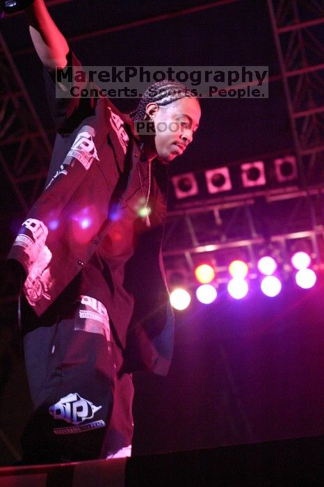 Ludacris performing on the first day of Music Midtown, 2004.

Filename: IMG_6205.jpg
Aperture: f/2.8
Shutter Speed: 1/80
Body: Canon EOS DIGITAL REBEL
Lens: Canon EF 50mm f/1.8 II