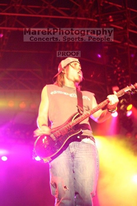 Puddle of Mudd performs on the first day of Music Midtown, 2004.

Filename: IMG_6045.jpg
Aperture: f/2.5
Shutter Speed: 1/50
Body: Canon EOS DIGITAL REBEL
Lens: Canon EF 50mm f/1.8 II