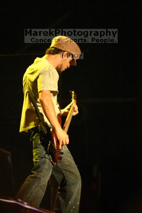 Puddle of Mudd performs on the first day of Music Midtown, 2004.

Filename: IMG_6054.jpg
Aperture: f/2.8
Shutter Speed: 1/160
Body: Canon EOS DIGITAL REBEL
Lens: Canon EF 80-200mm f/2.8 L