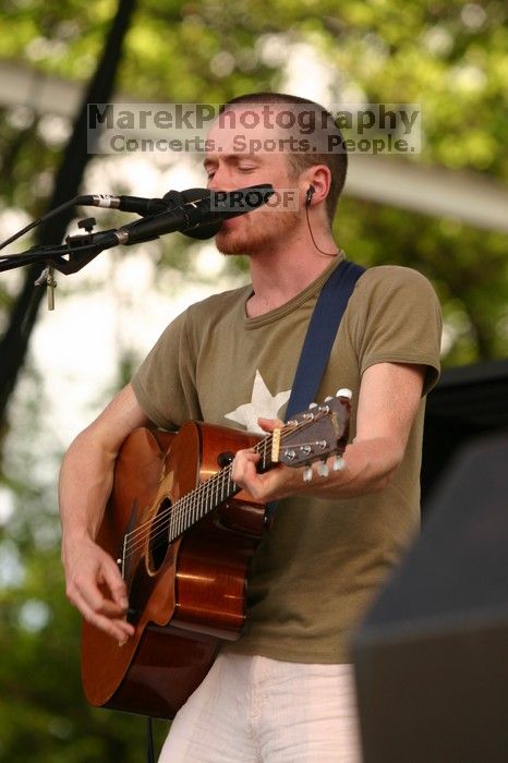 Damien Rice performs on the 99X stage on the second day of Music Midtown, 2004.

Filename: IMG_6373.jpg
Aperture: f/4.0
Shutter Speed: 1/320
Body: Canon EOS DIGITAL REBEL
Lens: Canon EF 80-200mm f/2.8 L