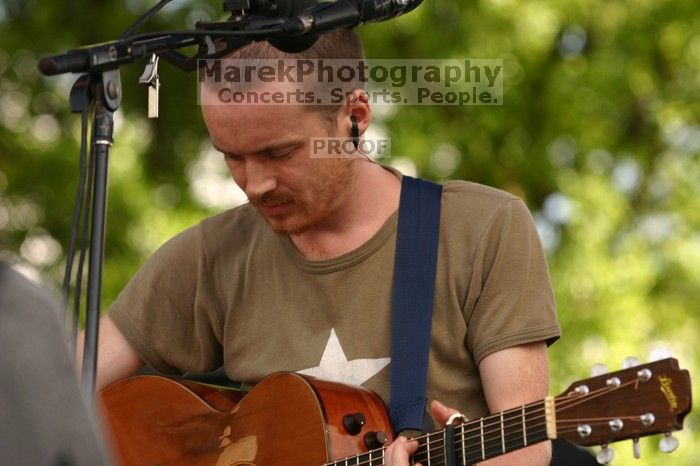 Damien Rice performs on the 99X stage on the second day of Music Midtown, 2004.

Filename: IMG_6300.jpg
Aperture: f/5.0
Shutter Speed: 1/250
Body: Canon EOS DIGITAL REBEL
Lens: Canon EF 80-200mm f/2.8 L