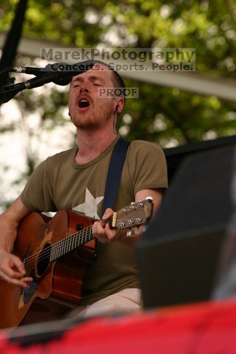 Damien Rice performs on the 99X stage on the second day of Music Midtown, 2004.

Filename: IMG_6375.jpg
Aperture: f/5.6
Shutter Speed: 1/320
Body: Canon EOS DIGITAL REBEL
Lens: Canon EF 80-200mm f/2.8 L