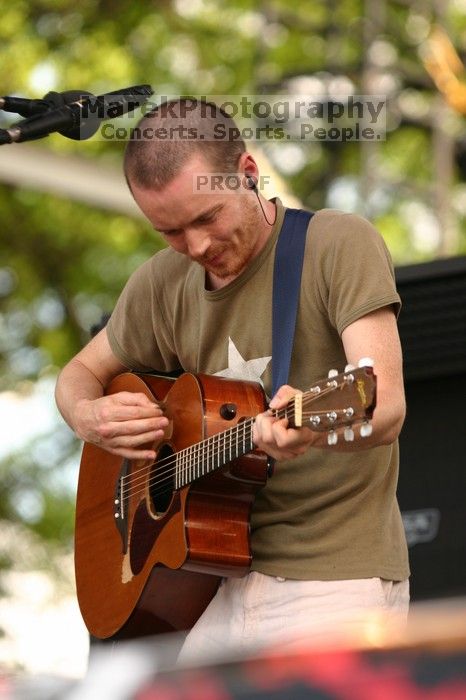 Damien Rice performs on the 99X stage on the second day of Music Midtown, 2004.

Filename: IMG_6344.jpg
Aperture: f/3.5
Shutter Speed: 1/320
Body: Canon EOS DIGITAL REBEL
Lens: Canon EF 80-200mm f/2.8 L