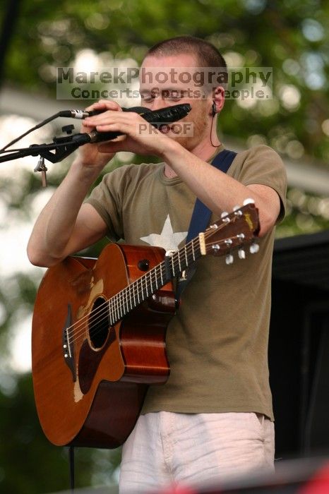 Damien Rice performs on the 99X stage on the second day of Music Midtown, 2004.

Filename: IMG_6333.jpg
Aperture: f/3.5
Shutter Speed: 1/320
Body: Canon EOS DIGITAL REBEL
Lens: Canon EF 80-200mm f/2.8 L