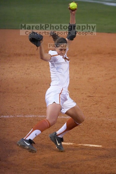 Cat Osterman pitching to the Mean Green.  The Lady Longhorns beat the University of North Texas 5-0 in the first game of the double header Wednesday night.

Filename: SRM_20060308_212302_0.jpg
Aperture: f/2.8
Shutter Speed: 1/1000
Body: Canon EOS 20D
Lens: Canon EF 80-200mm f/2.8 L