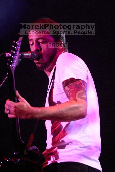 The Foo Fighters perform on the 99X stage on the second day of Music Midtown, 2004.

Filename: IMG_6830.jpg
Aperture: f/2.8
Shutter Speed: 1/250
Body: Canon EOS DIGITAL REBEL
Lens: Canon EF 80-200mm f/2.8 L