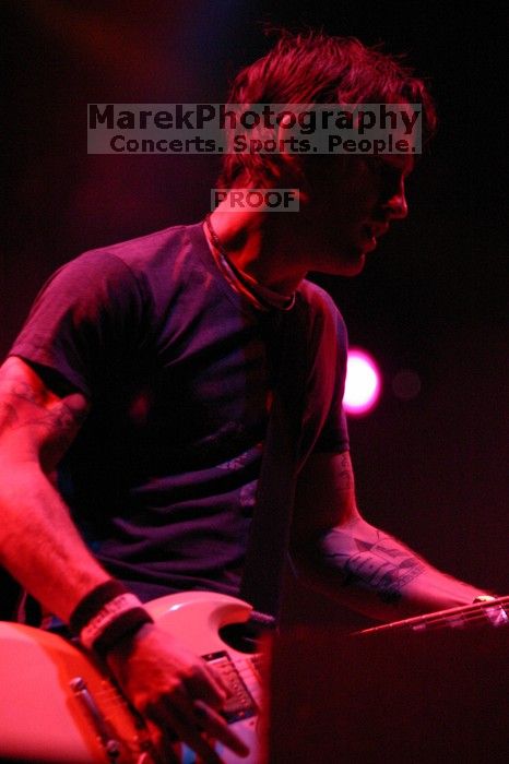 The Foo Fighters perform on the 99X stage on the second day of Music Midtown, 2004.

Filename: IMG_6753.jpg
Aperture: f/2.8
Shutter Speed: 1/250
Body: Canon EOS DIGITAL REBEL
Lens: Canon EF 80-200mm f/2.8 L