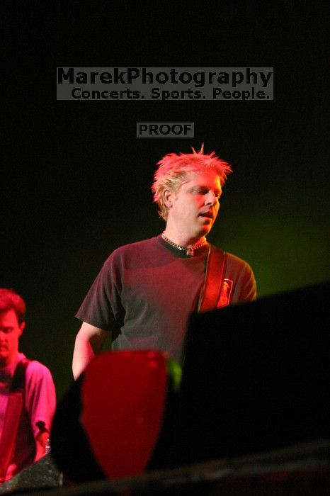 The Offspring performs on the 99X stage on the second day of Music Midtown, 2004.

Filename: IMG_6669.jpg
Aperture: f/2.8
Shutter Speed: 1/250
Body: Canon EOS DIGITAL REBEL
Lens: Canon EF 80-200mm f/2.8 L