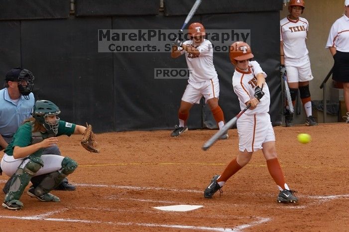 #9, Rachael Cook, bats against the Mean Green.  The Lady Longhorns beat the University of North Texas 5-0 in the first game of the double header Wednesday night.

Filename: SRM_20060308_205509_1.jpg
Aperture: f/4.5
Shutter Speed: 1/500
Body: Canon EOS 20D
Lens: Canon EF 80-200mm f/2.8 L