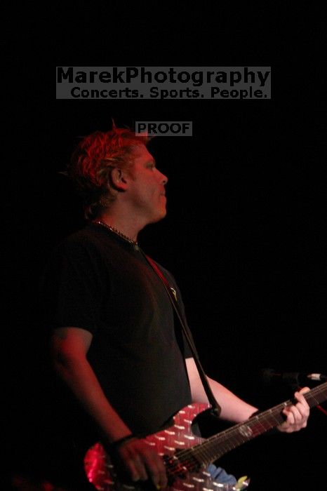 The Offspring performs on the 99X stage on the second day of Music Midtown, 2004.

Filename: IMG_6656.jpg
Aperture: f/2.8
Shutter Speed: 1/250
Body: Canon EOS DIGITAL REBEL
Lens: Canon EF 80-200mm f/2.8 L