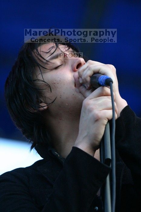 The Strokes perform on the 99X stage on the second day of Music Midtown, 2004.

Filename: IMG_6611.jpg
Aperture: f/3.5
Shutter Speed: 1/250
Body: Canon EOS DIGITAL REBEL
Lens: Canon EF 80-200mm f/2.8 L