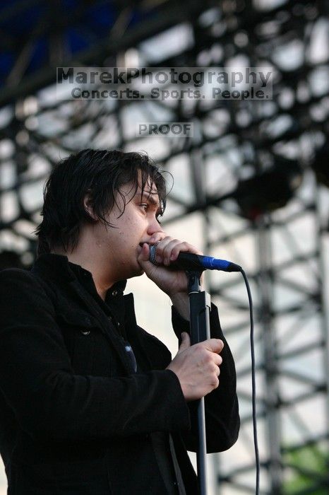 The Strokes perform on the 99X stage on the second day of Music Midtown, 2004.

Filename: IMG_6601.jpg
Aperture: f/4.0
Shutter Speed: 1/320
Body: Canon EOS DIGITAL REBEL
Lens: Canon EF 80-200mm f/2.8 L