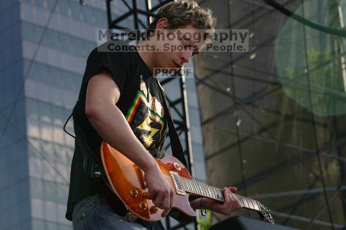 Trapt performs on the 99X stage on the second day of Music Midtown, 2004.

Filename: IMG_6476.jpg
Aperture: f/6.3
Shutter Speed: 1/320
Body: Canon EOS DIGITAL REBEL
Lens: Canon EF 80-200mm f/2.8 L