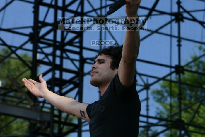 Trapt performs on the 99X stage on the second day of Music Midtown, 2004.

Filename: IMG_6456.jpg
Aperture: f/6.3
Shutter Speed: 1/320
Body: Canon EOS DIGITAL REBEL
Lens: Canon EF 80-200mm f/2.8 L