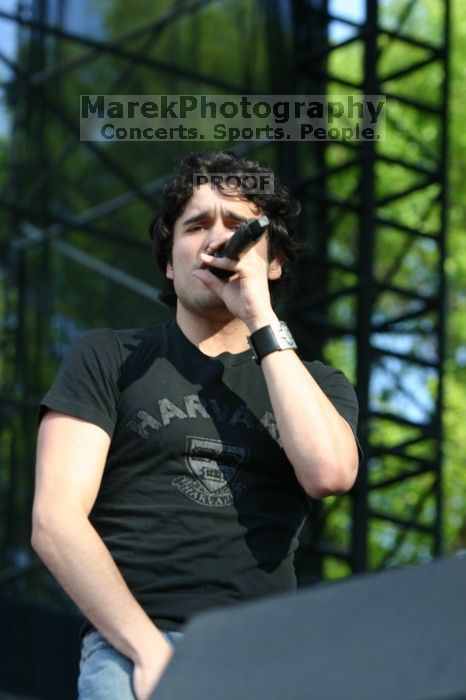 Trapt performs on the 99X stage on the second day of Music Midtown, 2004.

Filename: IMG_6445.jpg
Aperture: f/4.5
Shutter Speed: 1/320
Body: Canon EOS DIGITAL REBEL
Lens: Canon EF 80-200mm f/2.8 L