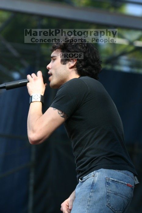Trapt performs on the 99X stage on the second day of Music Midtown, 2004.

Filename: IMG_6428.jpg
Aperture: f/4.5
Shutter Speed: 1/320
Body: Canon EOS DIGITAL REBEL
Lens: Canon EF 80-200mm f/2.8 L