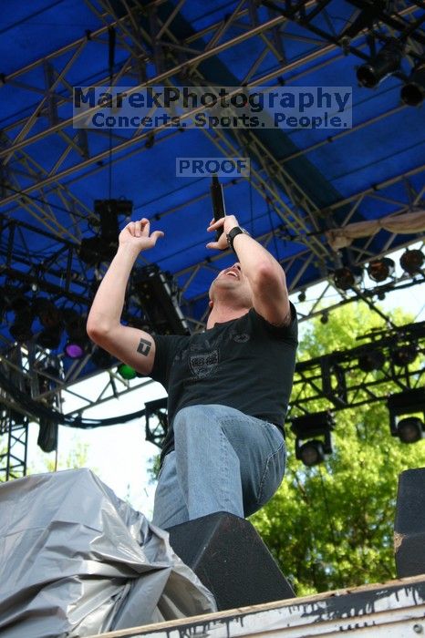 Trapt performs on the 99X stage on the second day of Music Midtown, 2004.

Filename: IMG_6511.jpg
Aperture: f/6.3
Shutter Speed: 1/125
Body: Canon EOS DIGITAL REBEL
Lens: Canon EF-S 18-55mm f/3.5-5.6