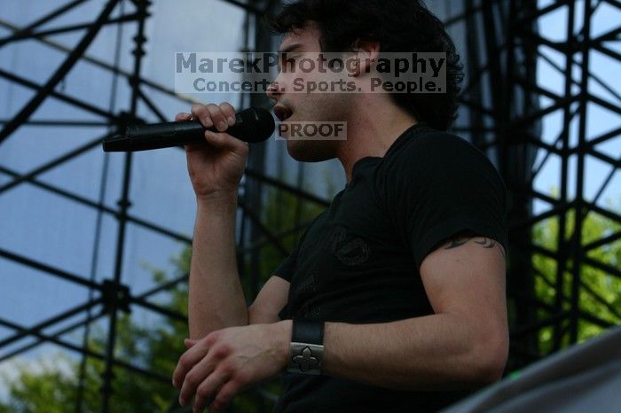 Trapt performs on the 99X stage on the second day of Music Midtown, 2004.

Filename: IMG_6538.jpg
Aperture: f/9.0
Shutter Speed: 1/320
Body: Canon EOS DIGITAL REBEL
Lens: Canon EF 80-200mm f/2.8 L