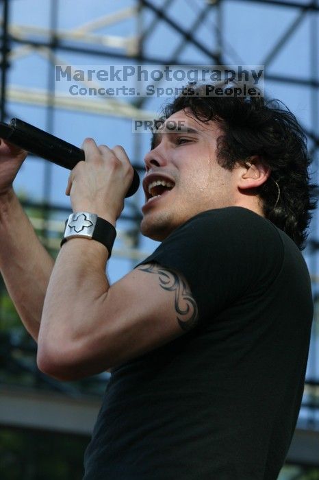 Trapt performs on the 99X stage on the second day of Music Midtown, 2004.

Filename: IMG_6559.jpg
Aperture: f/8.0
Shutter Speed: 1/320
Body: Canon EOS DIGITAL REBEL
Lens: Canon EF 80-200mm f/2.8 L