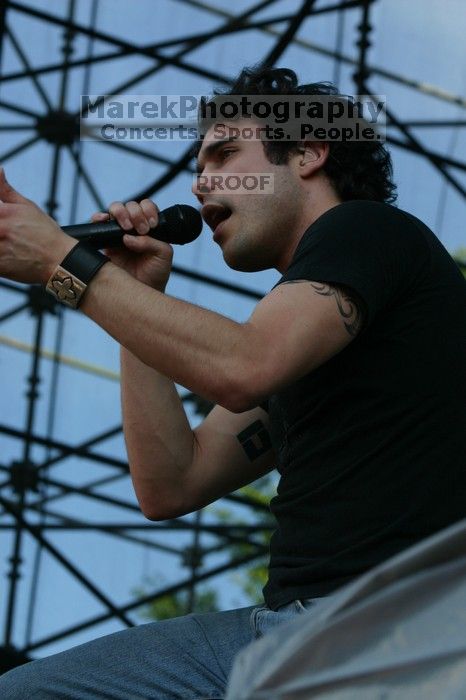 Trapt performs on the 99X stage on the second day of Music Midtown, 2004.

Filename: IMG_6536.jpg
Aperture: f/8.0
Shutter Speed: 1/320
Body: Canon EOS DIGITAL REBEL
Lens: Canon EF 80-200mm f/2.8 L
