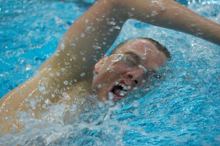 Blake Copple of the University of Texas Men's Varsity Swim Team placed 2nd in the 3rd heat of the 1650 Freestyle Prelims with a time of 15:57.48 at the Speedo American Short Course Championships.

Filename: SRM_20060304_114122_5.jpg
Aperture: f/2.8
Shutter Speed: 1/400
Body: Canon EOS 20D
Lens: Canon EF 80-200mm f/2.8 L