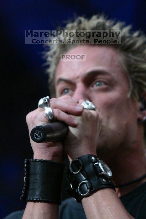 Fuel performs on the 99X stage on the third day of Music Midtown, 2004.

Filename: IMG_7209.jpg
Aperture: f/4.0
Shutter Speed: 1/320
Body: Canon EOS DIGITAL REBEL
Lens: Canon EF 80-200mm f/2.8 L