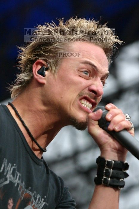 Fuel performs on the 99X stage on the third day of Music Midtown, 2004.

Filename: IMG_7135.jpg
Aperture: f/5.0
Shutter Speed: 1/250
Body: Canon EOS DIGITAL REBEL
Lens: Canon EF 80-200mm f/2.8 L
