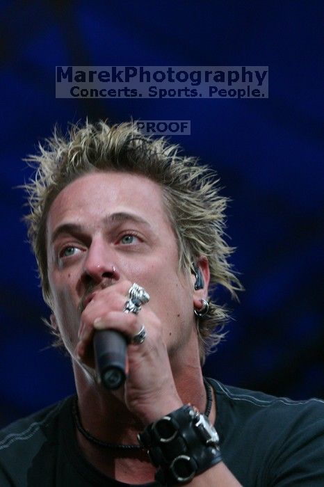 Fuel performs on the 99X stage on the third day of Music Midtown, 2004.

Filename: IMG_7196.jpg
Aperture: f/4.5
Shutter Speed: 1/320
Body: Canon EOS DIGITAL REBEL
Lens: Canon EF 80-200mm f/2.8 L