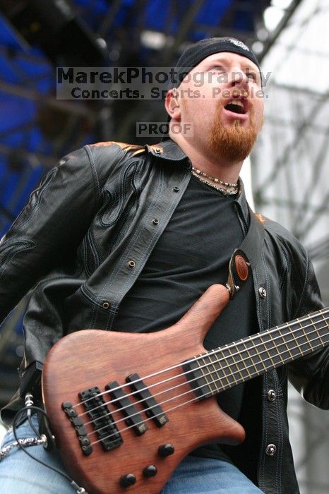 Fuel performs on the 99X stage on the third day of Music Midtown, 2004.

Filename: IMG_7120.jpg
Aperture: f/3.5
Shutter Speed: 1/250
Body: Canon EOS DIGITAL REBEL
Lens: Canon EF 80-200mm f/2.8 L