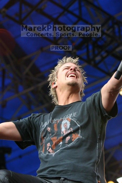 Fuel performs on the 99X stage on the third day of Music Midtown, 2004.

Filename: IMG_7107.jpg
Aperture: f/4.0
Shutter Speed: 1/250
Body: Canon EOS DIGITAL REBEL
Lens: Canon EF 80-200mm f/2.8 L