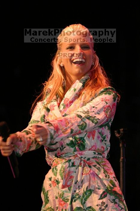 Jessica Simpson performs on the third day of Music Midtown, 2004.

Filename: IMG_7252.jpg
Aperture: f/2.8
Shutter Speed: 1/250
Body: Canon EOS DIGITAL REBEL
Lens: Canon EF 80-200mm f/2.8 L
