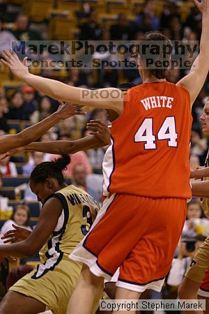 The Georgia Tech women's basketball team played Clemson.

Filename: img_0560_std.jpg
Aperture: f/2.8
Shutter Speed: 1/320
Body: Canon EOS DIGITAL REBEL
Lens: Canon EF 80-200mm f/2.8 L