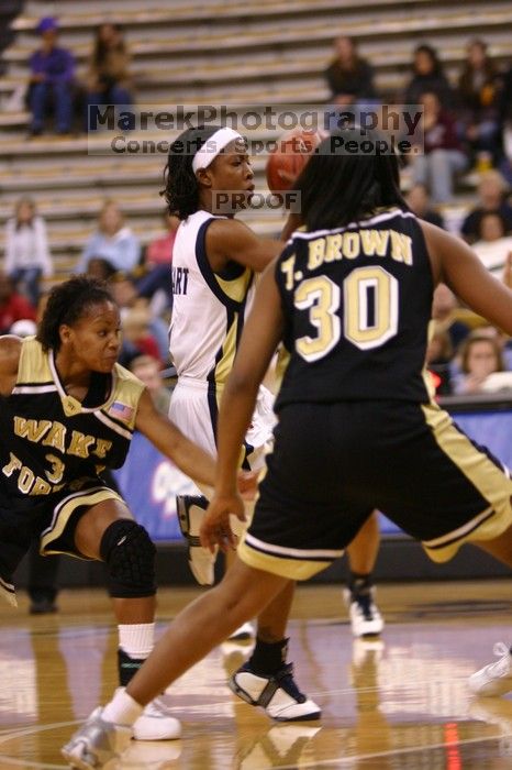 The Georgia Tech women's basketball team played Wake Forest.

Filename: IMG_1083.jpg
Aperture: f/2.8
Shutter Speed: 1/250
Body: Canon EOS DIGITAL REBEL
Lens: Canon EF 80-200mm f/2.8 L