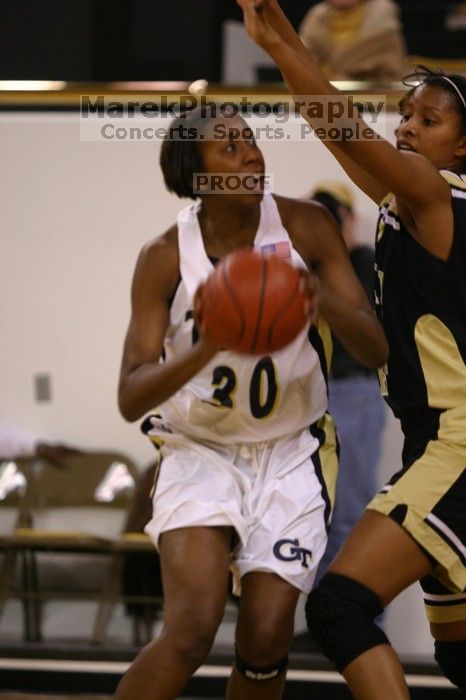 The Georgia Tech women's basketball team played Wake Forest.

Filename: IMG_1024.jpg
Aperture: f/2.8
Shutter Speed: 1/320
Body: Canon EOS DIGITAL REBEL
Lens: Canon EF 80-200mm f/2.8 L