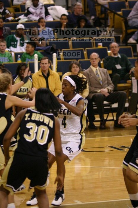 The Georgia Tech women's basketball team played Wake Forest.

Filename: IMG_1122.jpg
Aperture: f/2.8
Shutter Speed: 1/320
Body: Canon EOS DIGITAL REBEL
Lens: Canon EF 80-200mm f/2.8 L