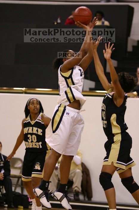 The Georgia Tech women's basketball team played Wake Forest.

Filename: IMG_1032.jpg
Aperture: f/2.8
Shutter Speed: 1/320
Body: Canon EOS DIGITAL REBEL
Lens: Canon EF 80-200mm f/2.8 L